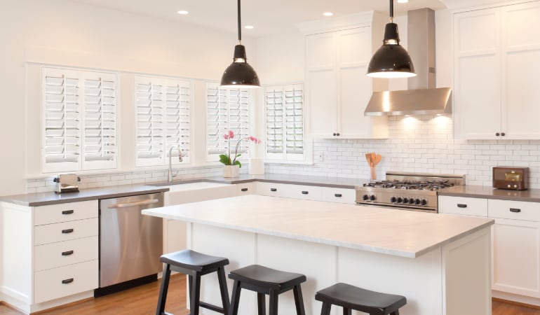 Plantation shutters in a bright Sacramento kitchen.